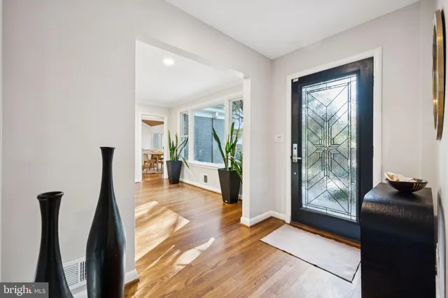 a view of a living room filled with furniture