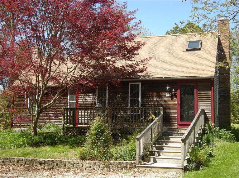 972 River Road Marstons Mills, MA 02648 - Photo 1 of 32 front view of house with a tree