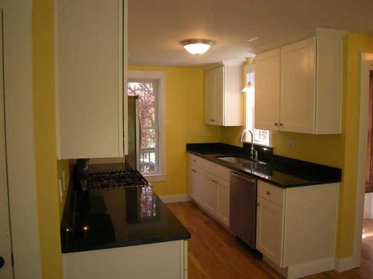 972 River Road Marstons Mills, MA 02648 - Photo 5 of 32 a kitchen with a sink and a stove top oven