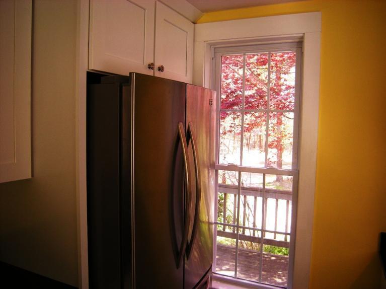 972 River Road Marstons Mills, MA 02648 - Photo 9 of 32 a view of kitchen with stainless steel appliances granite countertop and a window