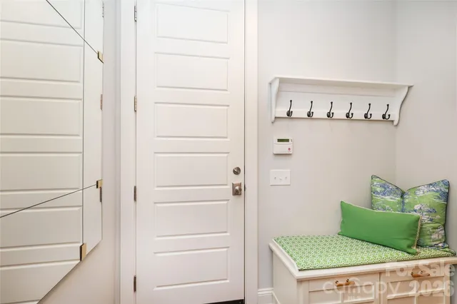 a view of a kitchen from the hallway