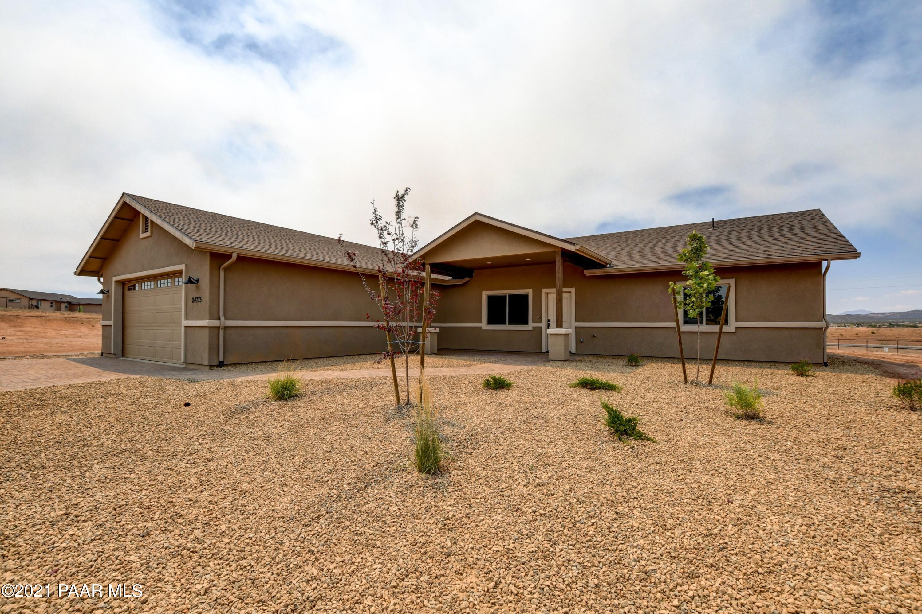 1495 Saddle Road Paulden, AZ 86334 - Photo 1 of 33 a house view with a backyard space