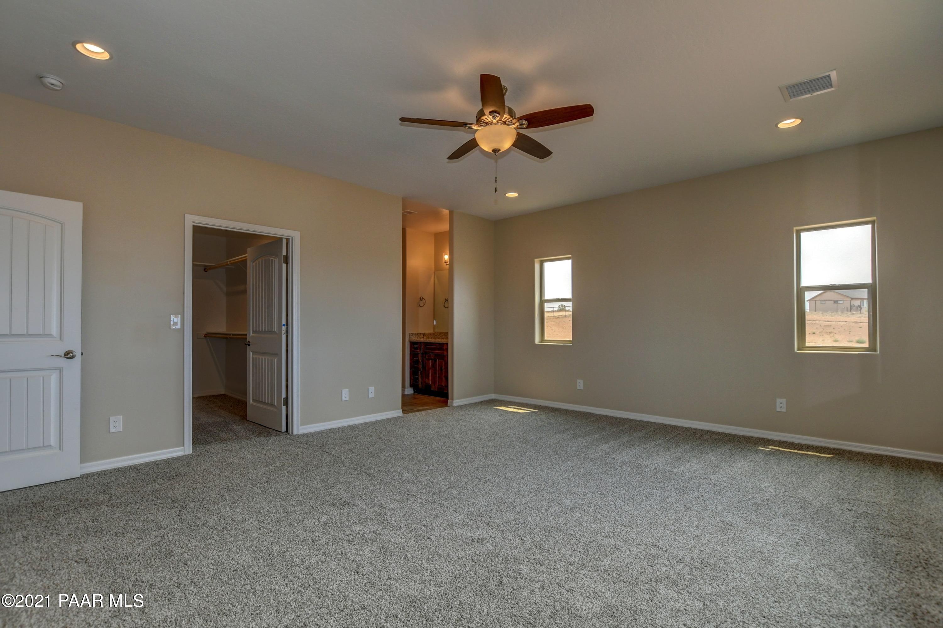 1495 Saddle Road Paulden, AZ 86334 - Photo 21 of 33 a view of an empty room with a window