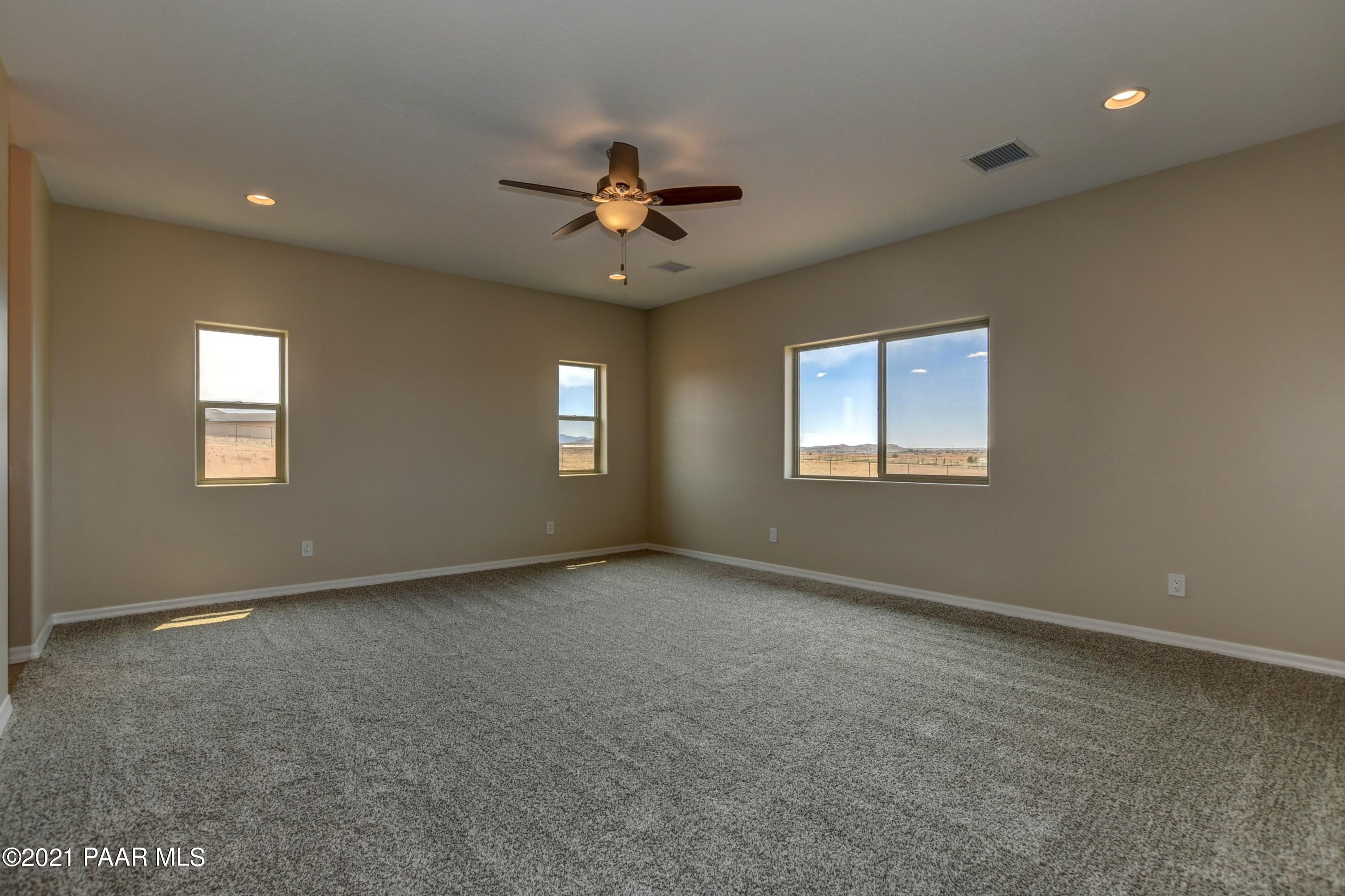 1495 Saddle Road Paulden, AZ 86334 - Photo 22 of 33 a view of an empty room with a window
