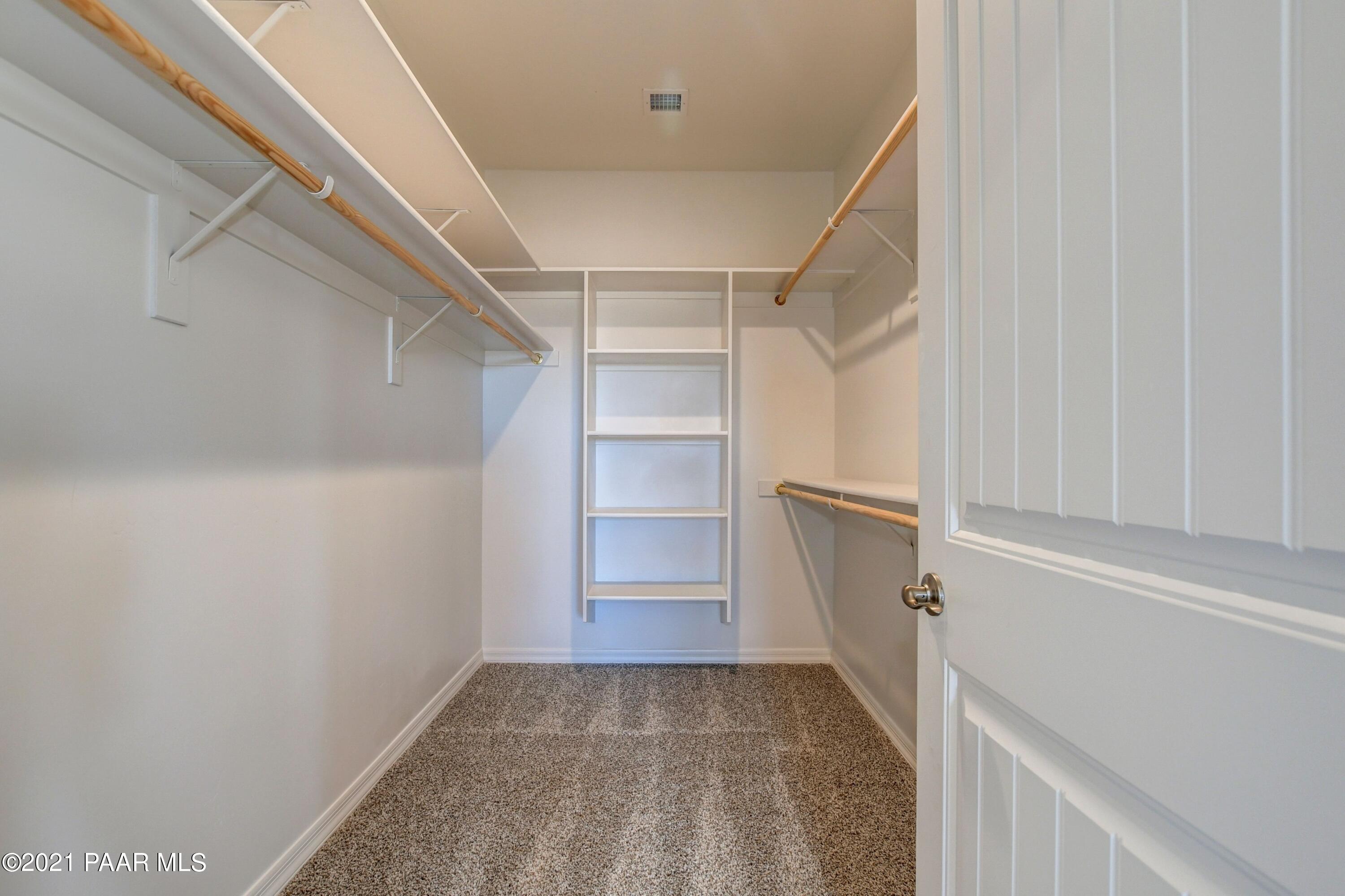 1495 Saddle Road Paulden, AZ 86334 - Photo 30 of 33 a view of walk in closet with empty racks