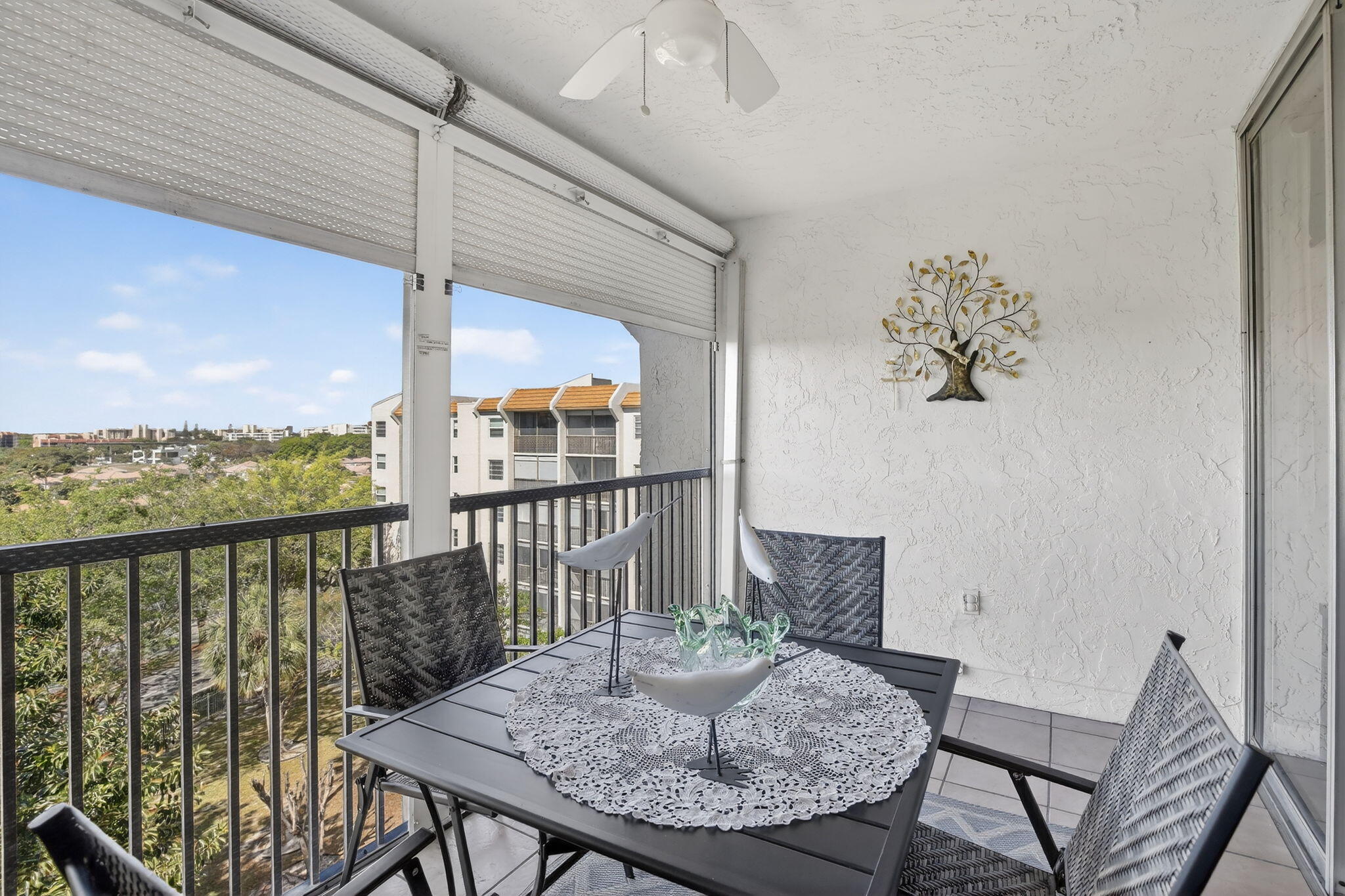 3910 Inverrary Boulevard, Unit 802B Lauderhill, FL 33319 - Photo 26 of 36 a view of a balcony with table and chairs