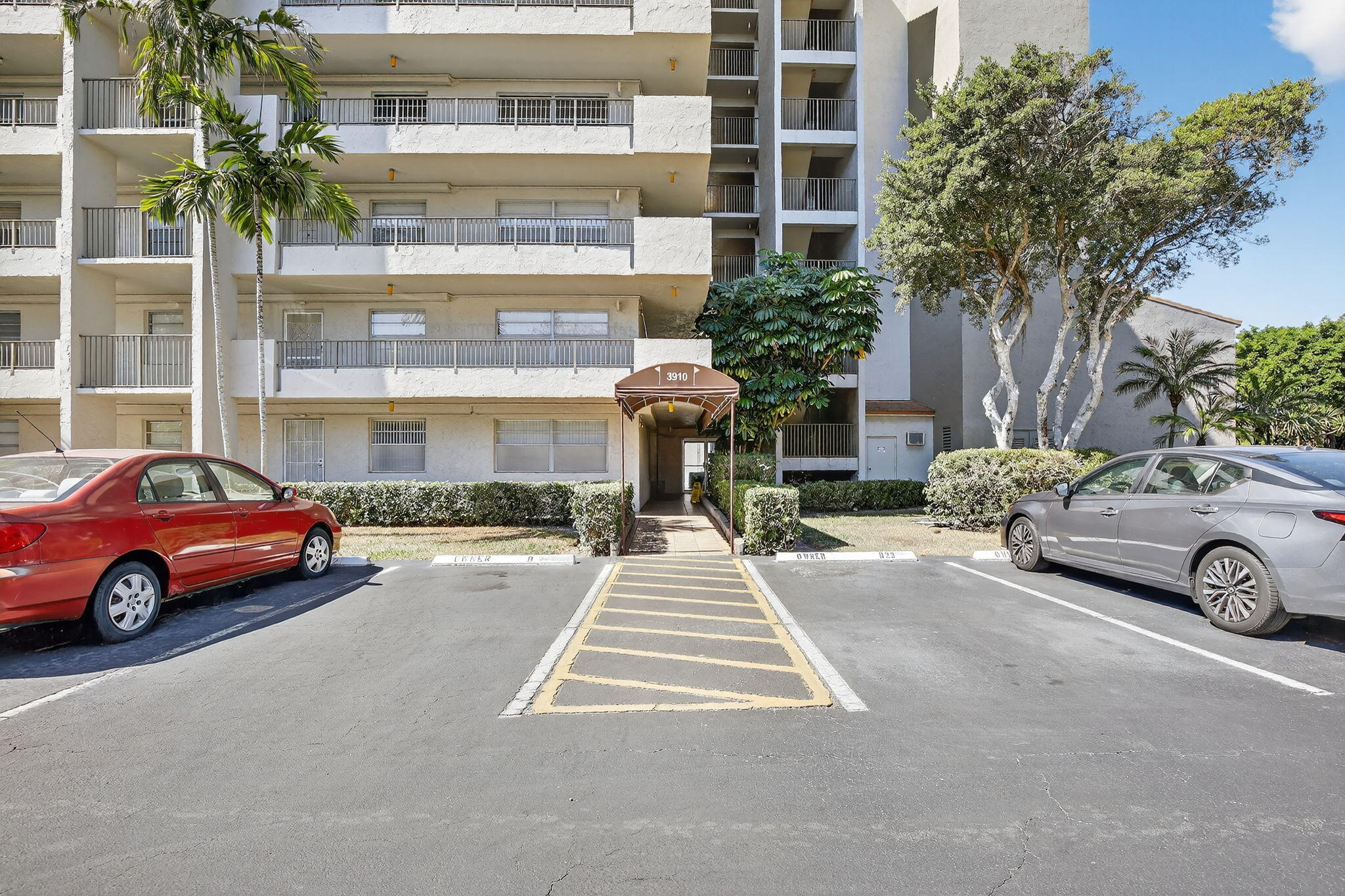 3910 Inverrary Boulevard, Unit 802B Lauderhill, FL 33319 - Photo 29 of 36 a view of a car parked in front of a building