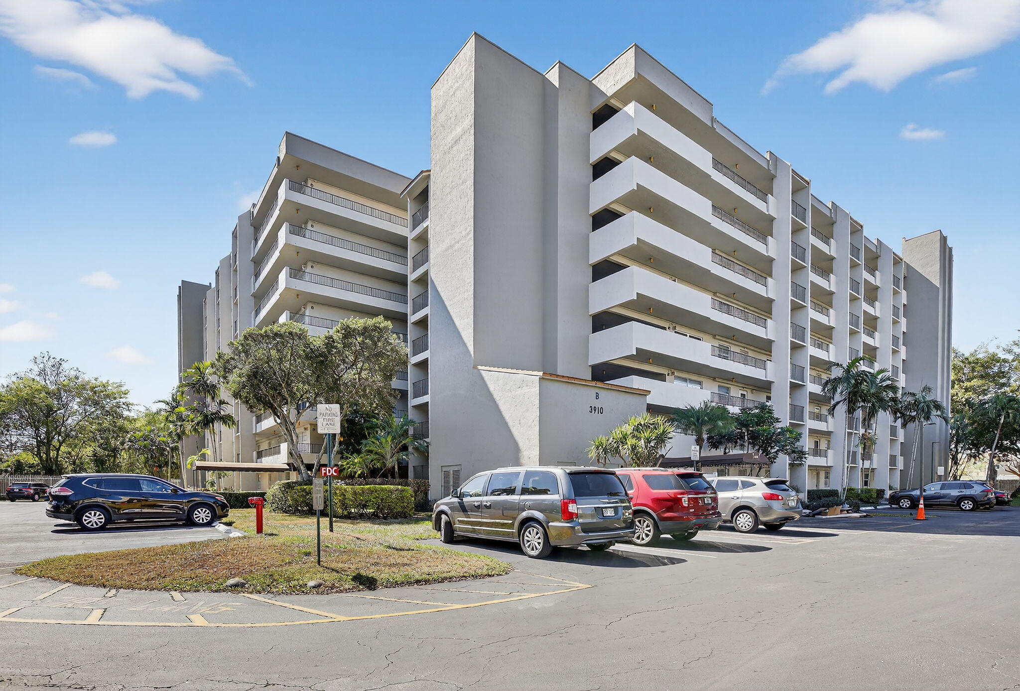 3910 Inverrary Boulevard, Unit 802B Lauderhill, FL 33319 - Photo 36 of 36 a car parked in front of a building