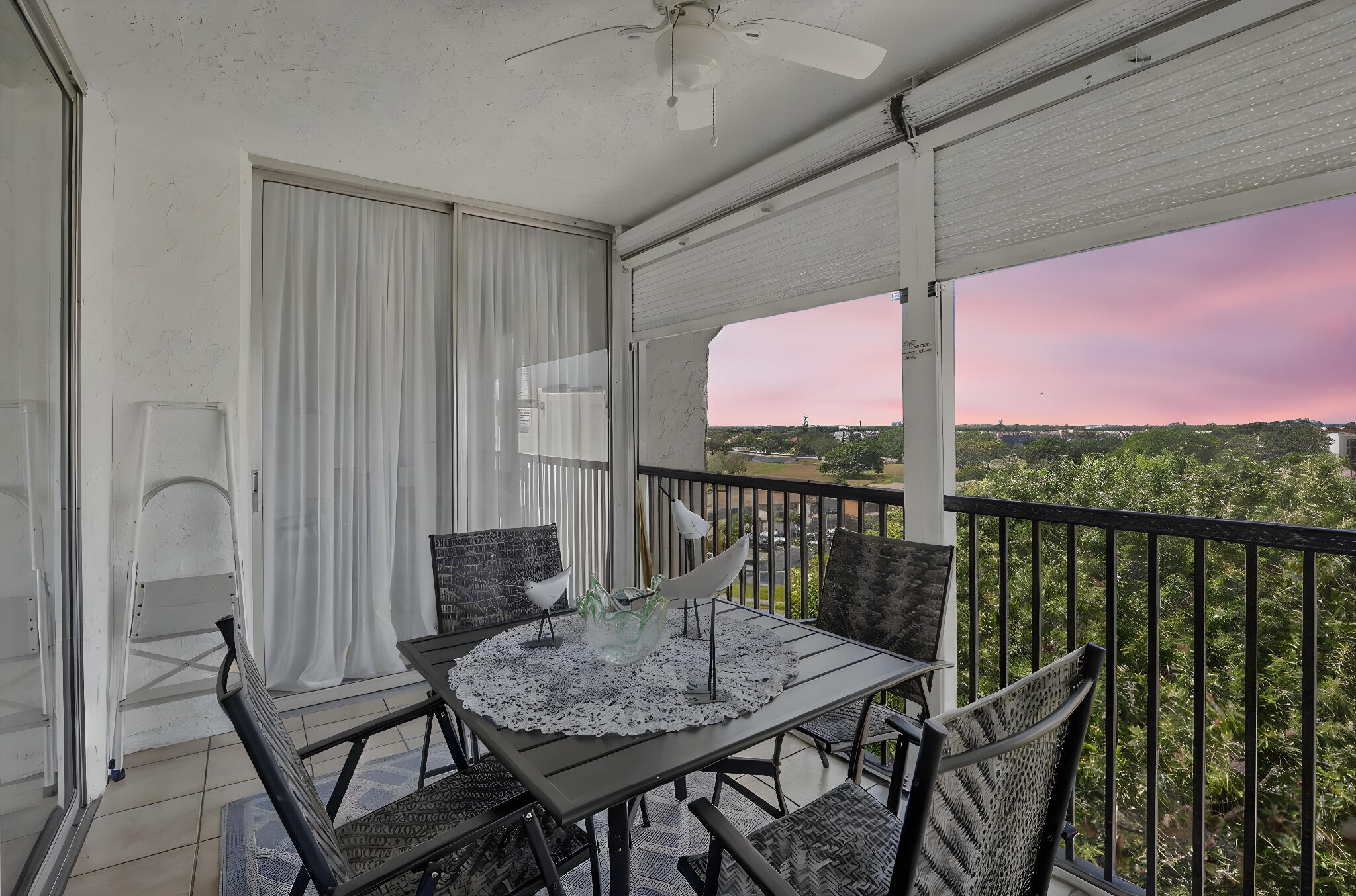 3910 Inverrary Boulevard, Unit 802B Lauderhill, FL 33319 - Photo 4 of 36 a view of a balcony dining table and chairs