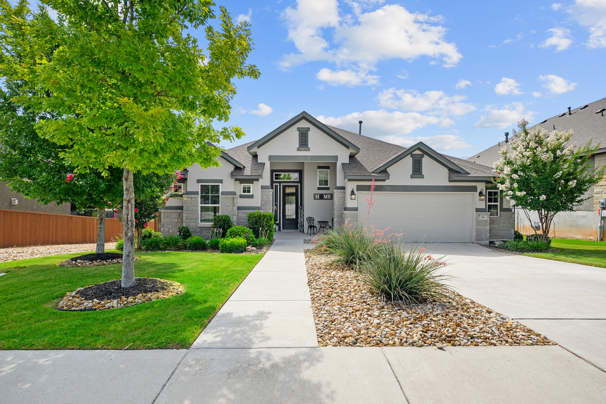 68 Rancho Trail Georgetown, TX 78628 - Photo 1 of 39 Well-maintained landscaping frames this charming facade with inviting curb appeal.