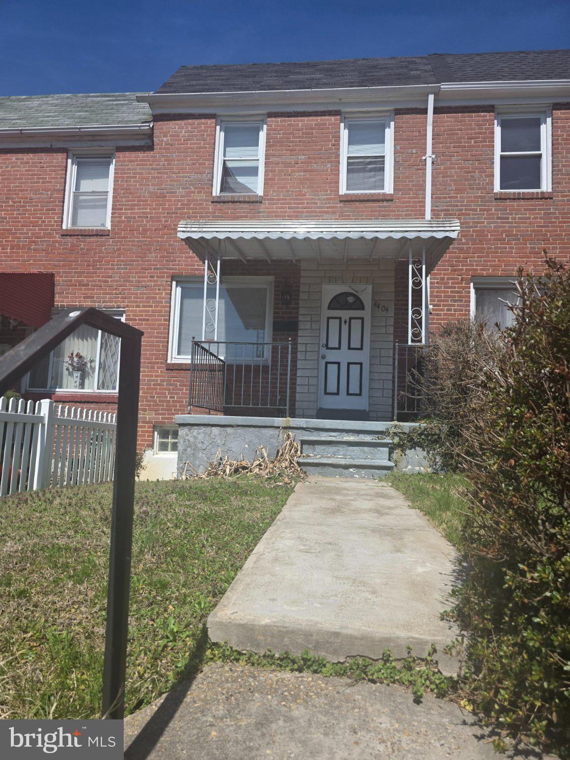 4404 Mountview Road Baltimore, MD 21229 - Photo 1 of 22 front view of a house with a yard