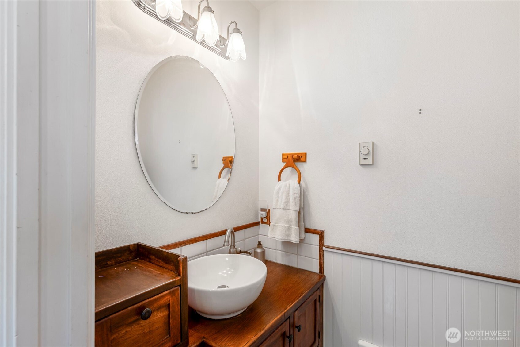 4375 Erin Street Port Townsend, WA 98368 - Photo 11 of 40 a bathroom with a sink and a mirror