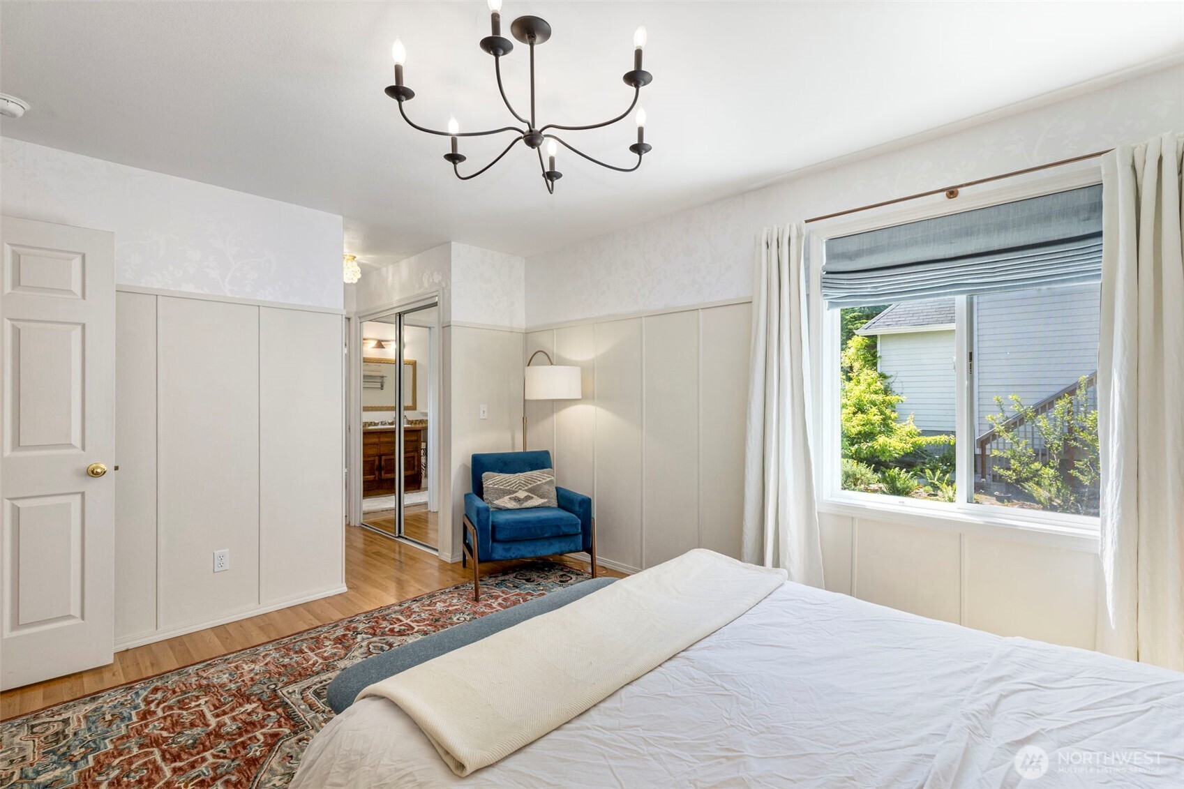 4375 Erin Street Port Townsend, WA 98368 - Photo 16 of 40 a bedroom with a large bed and window