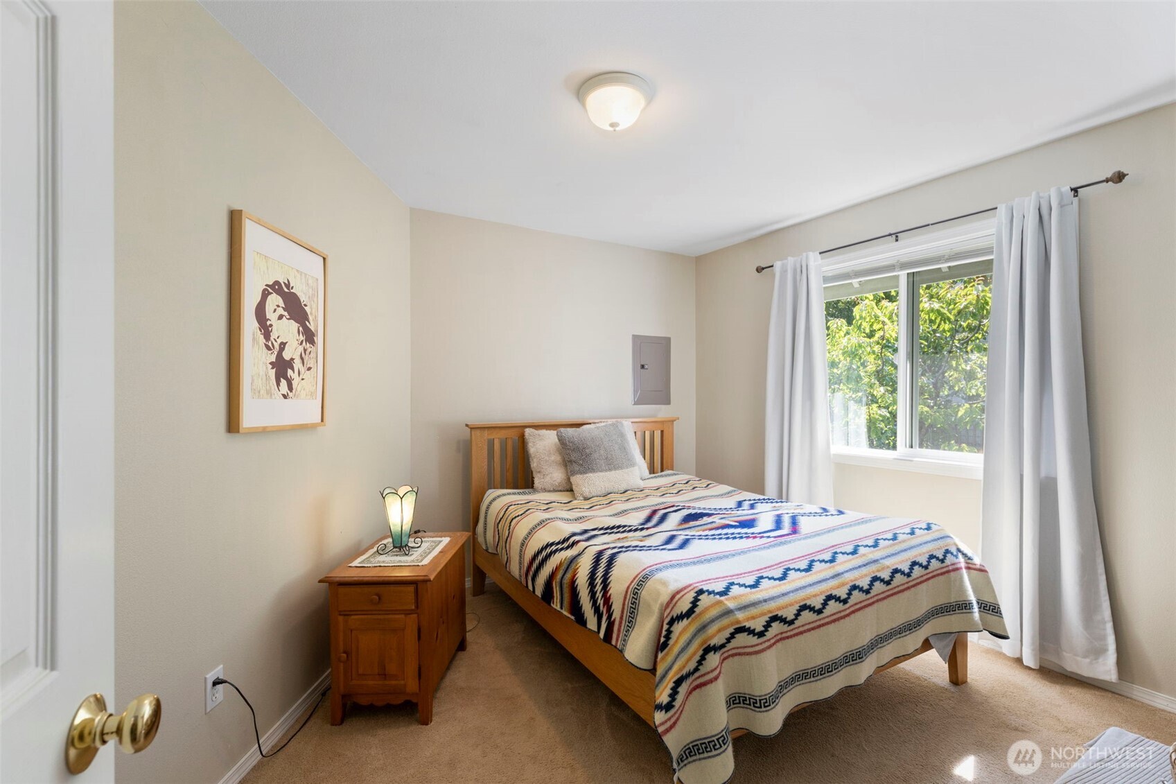 4375 Erin Street Port Townsend, WA 98368 - Photo 30 of 40 a bedroom with a bed and a window