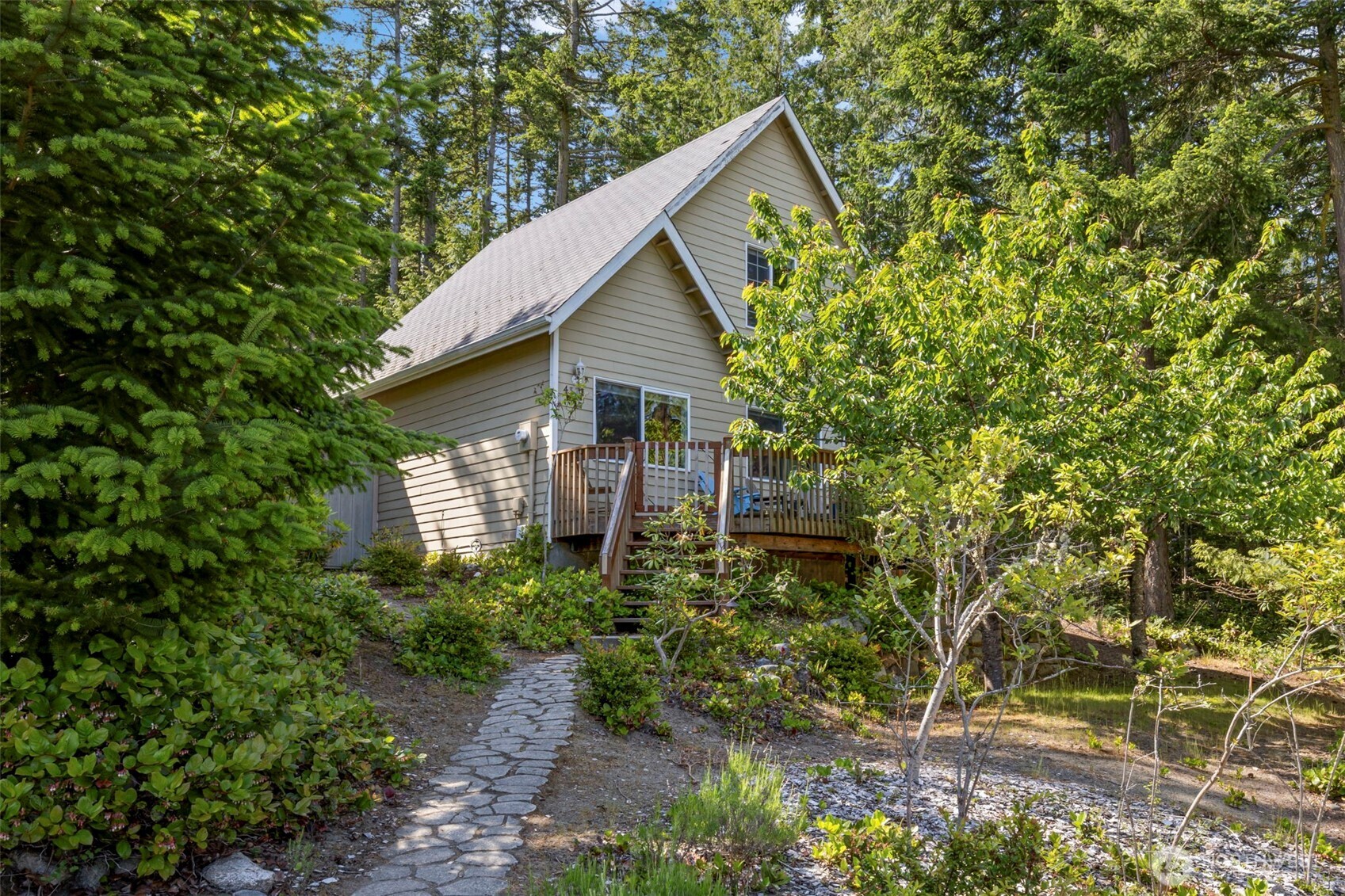 4375 Erin Street Port Townsend, WA 98368 - Photo 32 of 40 a view of a house with a small yard plants and large tree