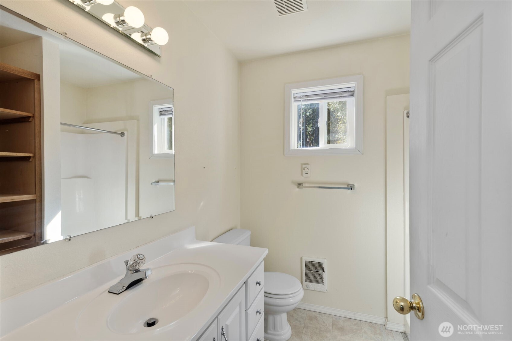 4375 Erin Street Port Townsend, WA 98368 - Photo 37 of 40 a bathroom with a sink a toilet and shower