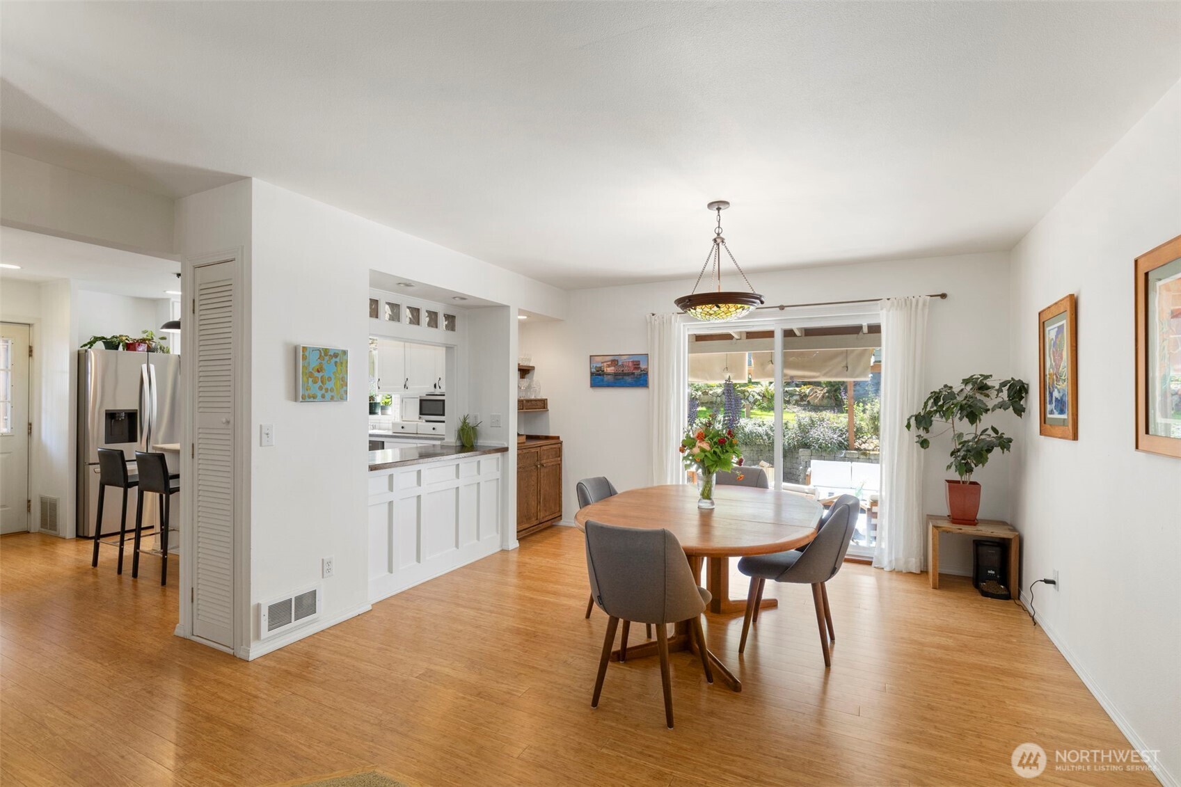 4375 Erin Street Port Townsend, WA 98368 - Photo 6 of 40 a dining room with furniture window and wooden floor