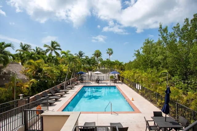 a view of a swimming pool with a patio