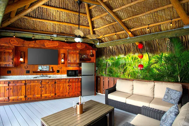 a patio with a patio table and chairs