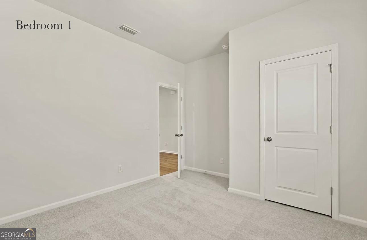 67 Shade Tree Drive Richmond Hill, GA 31324 - Photo 11 of 25 a view of an empty room