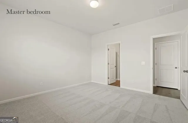 a bathroom with a sink toilet and vanity
