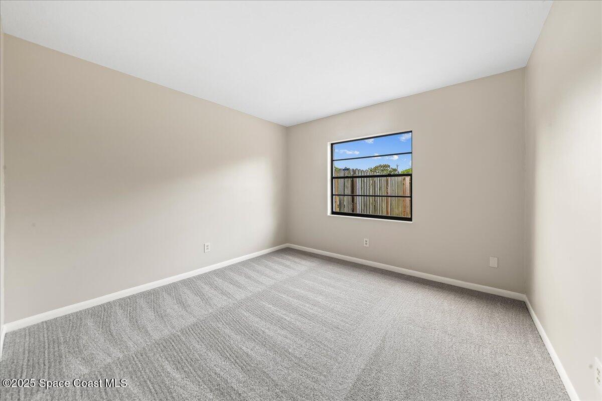 2010 Talloak Road Melbourne, FL 32935 - Photo 13 of 45 Bedroom 2 & 3