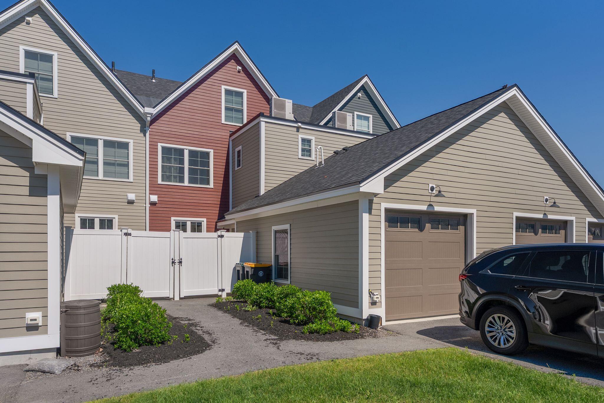 23 Frontrunner Way, Unit B1B Scarborough, ME 04074 - Photo 39 of 41 Patio Entrance-Garage-Rear