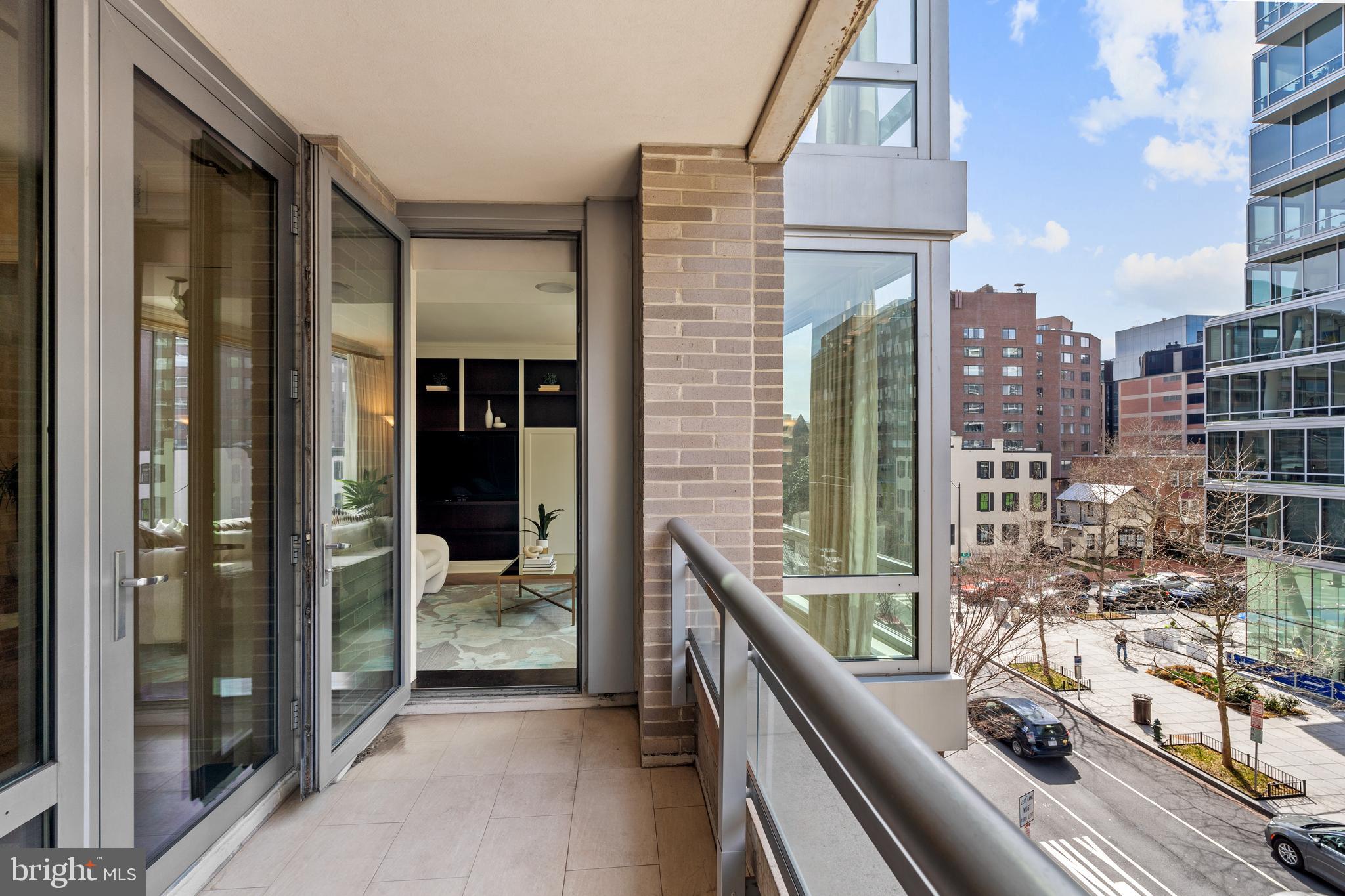 1111 23rd Street Northwest, Unit 4C Washington, DC 20037 - Photo 13 of 45 a view of city from balcony