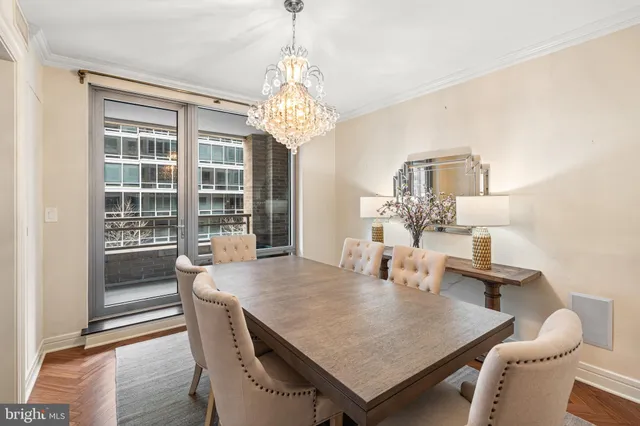 a kitchen with stainless steel appliances a stove a refrigerator and a sink