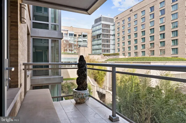 a view of balcony with furniture