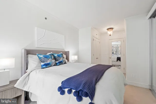 a bathroom with a shower sink and mirror