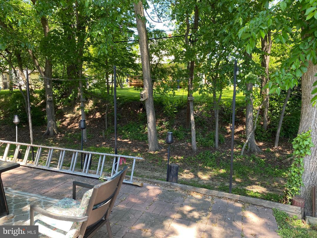14 Thomas Lane Sparrows Point, MD 21219 - Photo 9 of 26 a view of a chair and tables in the patio