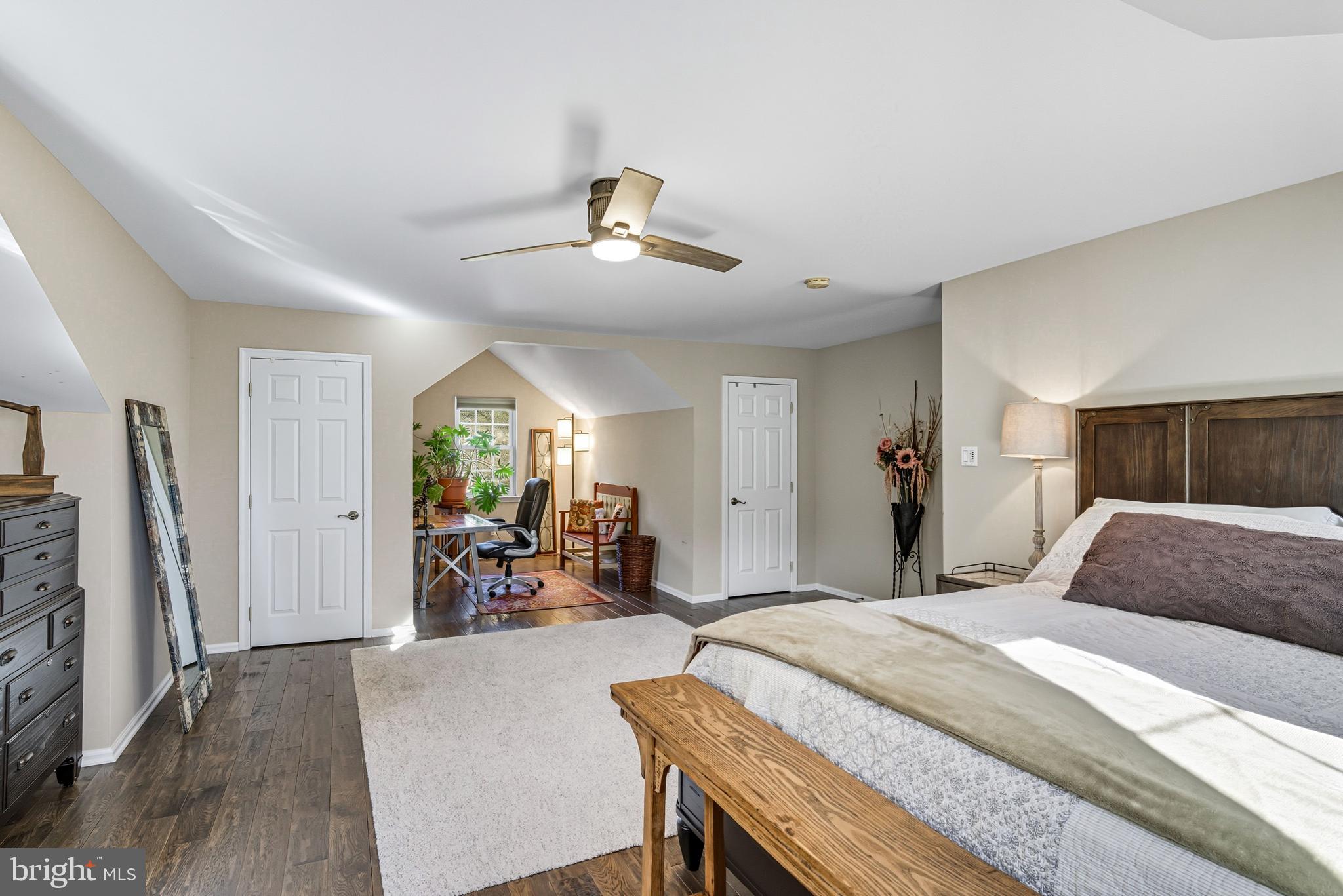 6 Edison Lane Doylestown, PA 18901 - Photo 18 of 24 a bedroom with a bed a couch and a window
