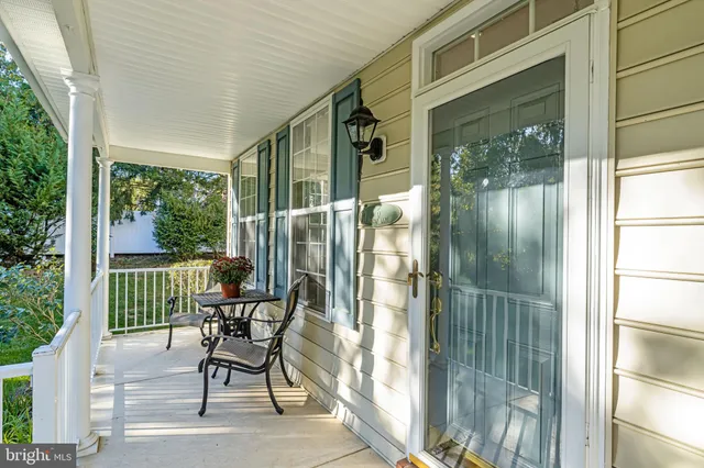 a living room with furniture fireplace and flat screen tv