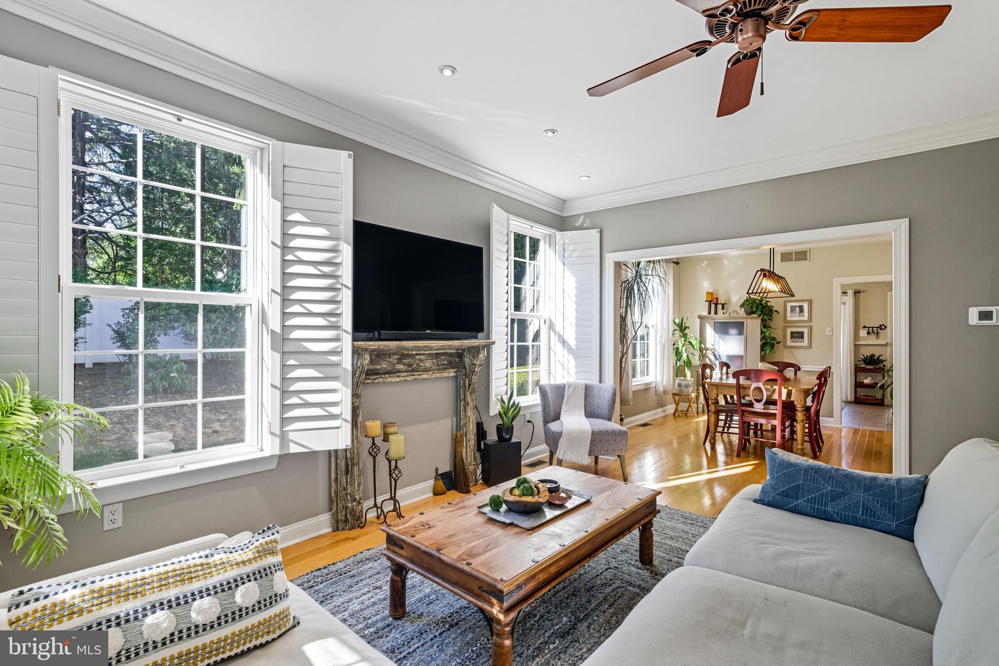 6 Edison Lane Doylestown, PA 18901 - Photo 5 of 24 a living room with furniture a flat screen tv and a window