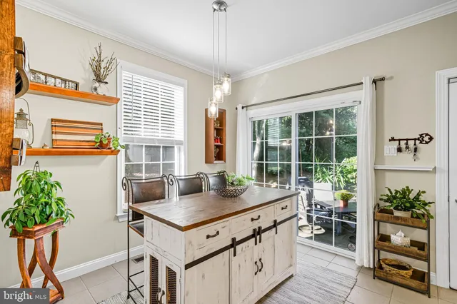 a bathroom with a sink vanity and mirror
