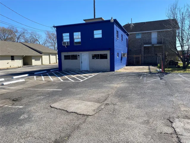 a big house with large windows