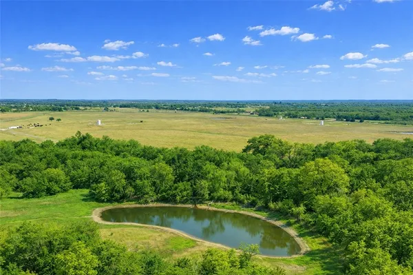 a view of a lake from a city