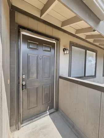 a view of entryway with a front door