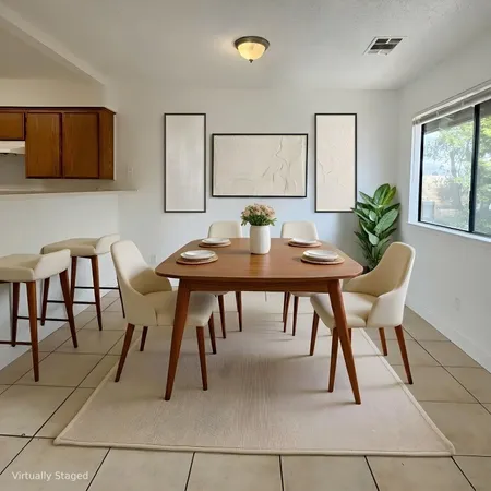 a view of a dining room with furniture