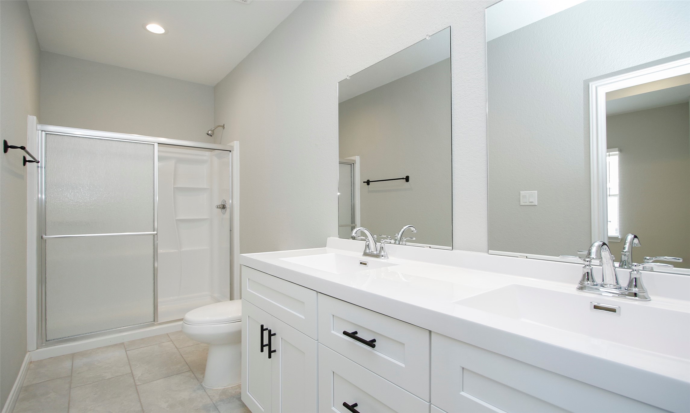 14010 Longstreet Road, Unit 1B Willis, TX 77318 - Photo 29 of 44 a bathroom with a sink a toilet and shower