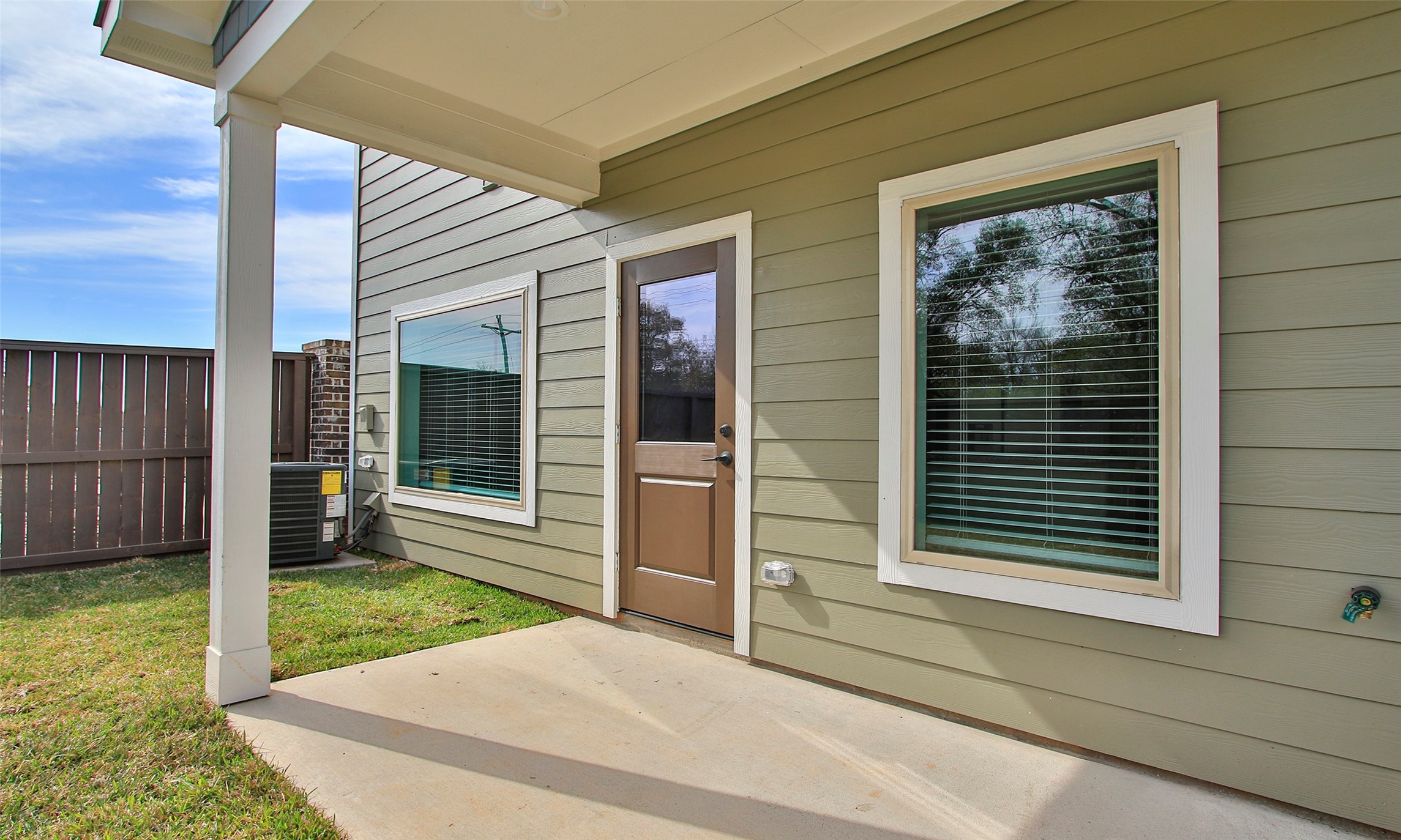 14010 Longstreet Road, Unit 1B Willis, TX 77318 - Photo 37 of 44 a house view with a outdoor space