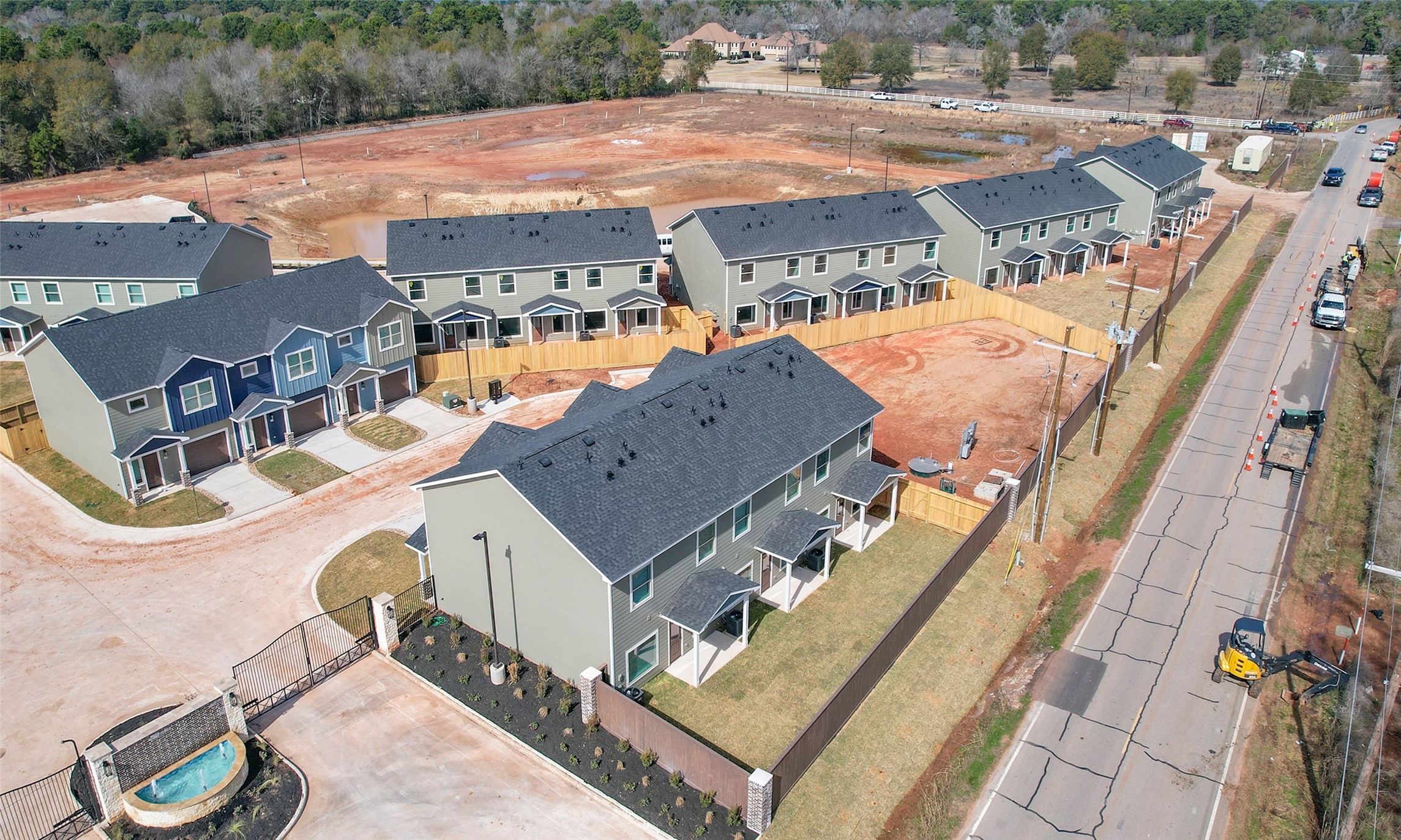 14010 Longstreet Road, Unit 1B Willis, TX 77318 - Photo 44 of 44 an aerial view of a house with a swimming pool