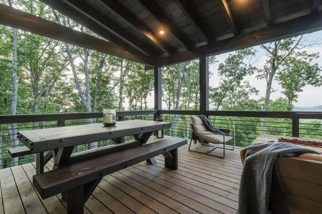 a bathroom with a shower sink and mirror