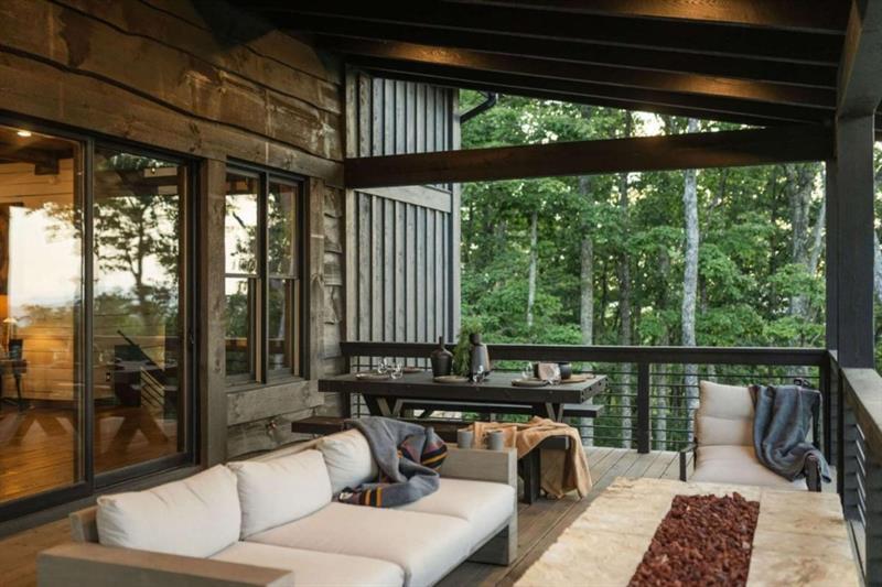 224 Eagles Ridge Morganton, GA 30560 - Photo 28 of 73 a living room with furniture and a floor to ceiling window
