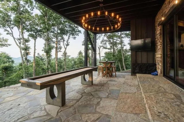 a view of a city with lush green forest