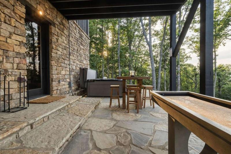 224 Eagles Ridge Morganton, GA 30560 - Photo 47 of 73 a view of a patio with a table chairs and backyard