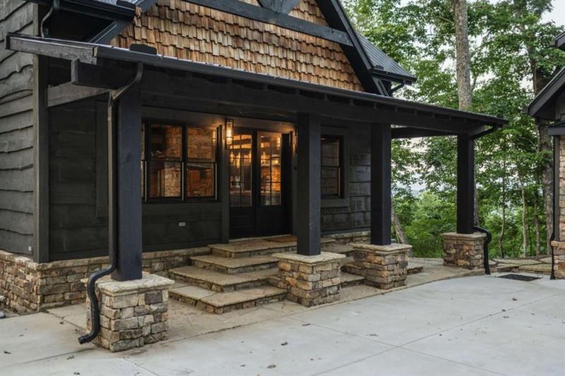 224 Eagles Ridge Morganton, GA 30560 - Photo 5 of 73 a backyard of a house with fountain table and chairs