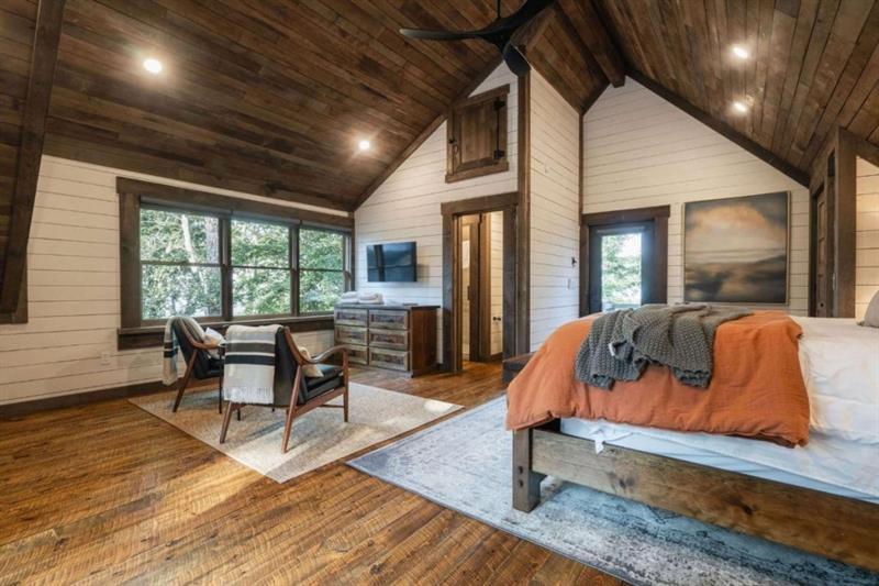 224 Eagles Ridge Morganton, GA 30560 - Photo 55 of 73 a living room with furniture and a wooden floor