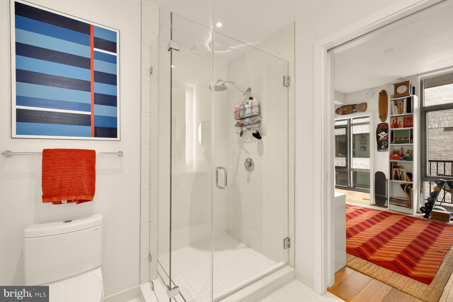 810 O Street Northwest, Unit 809 Washington, DC 20001 - Photo 13 of 30 a bathroom with a shower and a sink